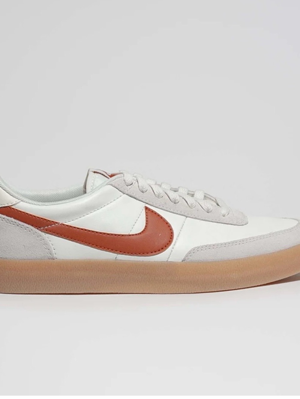 Nike White Leather Low-Top Sneaker with Rust Swoosh